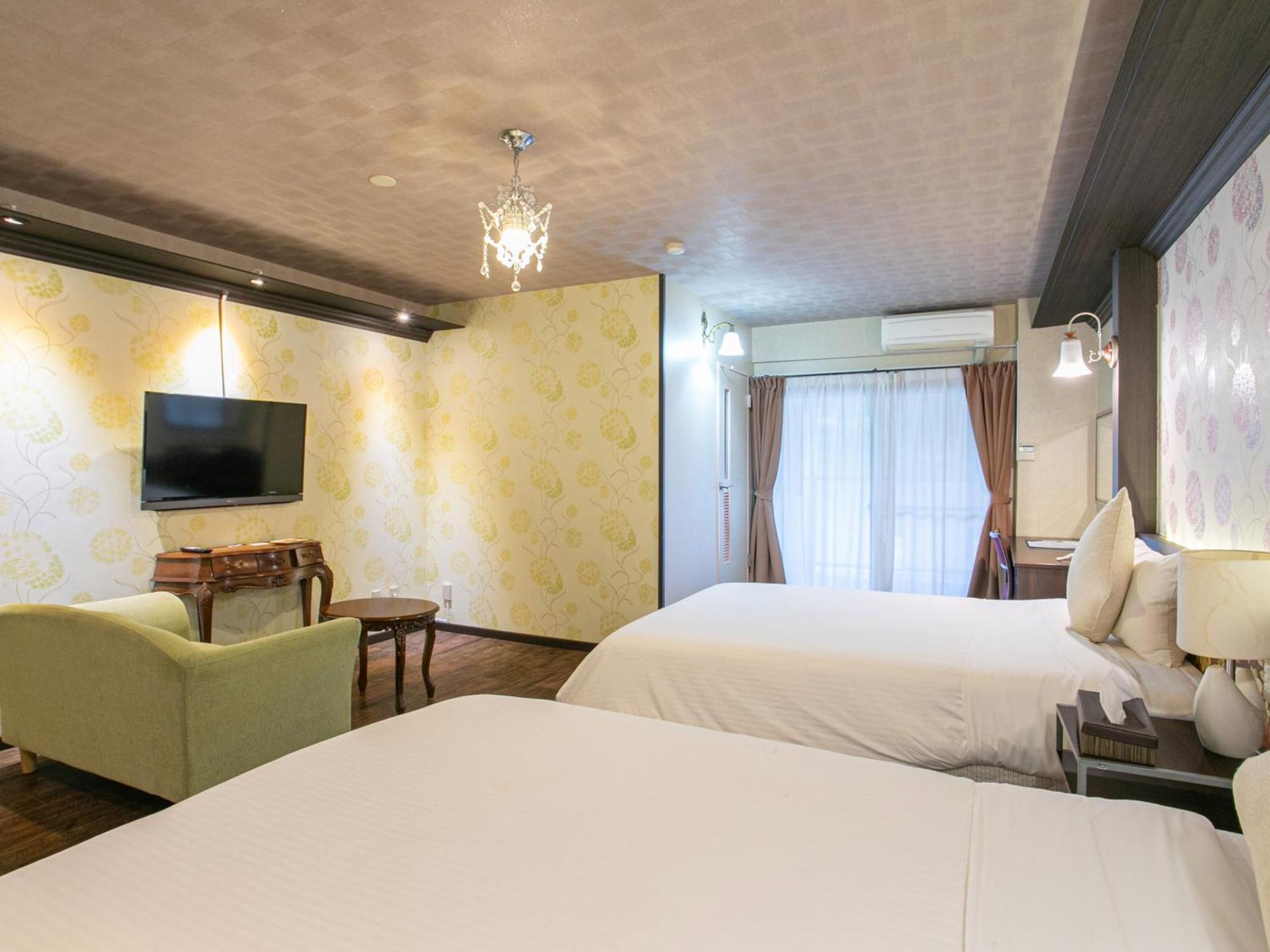 Yufuin Besso Shikisai Hotel Quarto foto