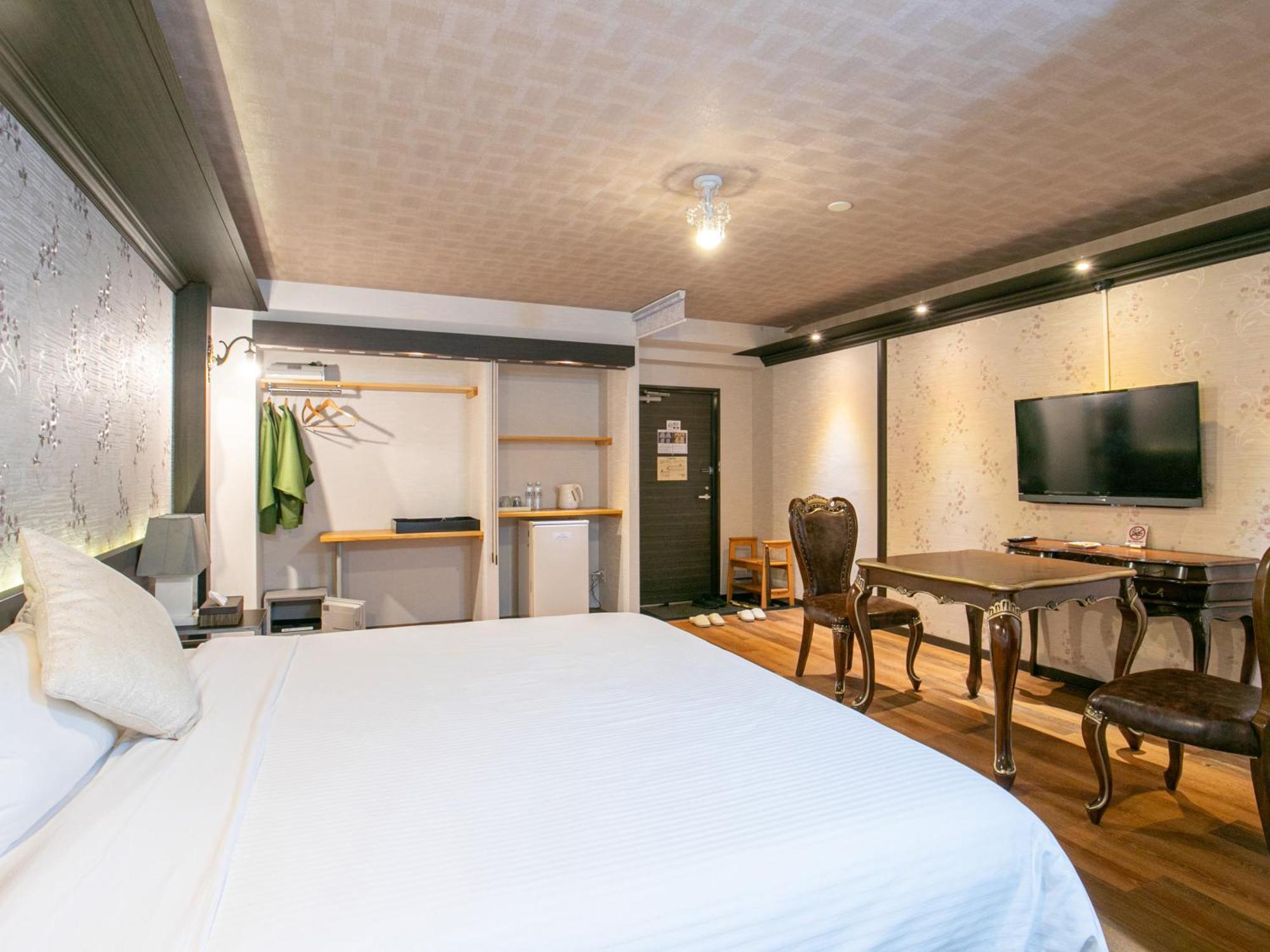 Yufuin Besso Shikisai Hotel Quarto foto