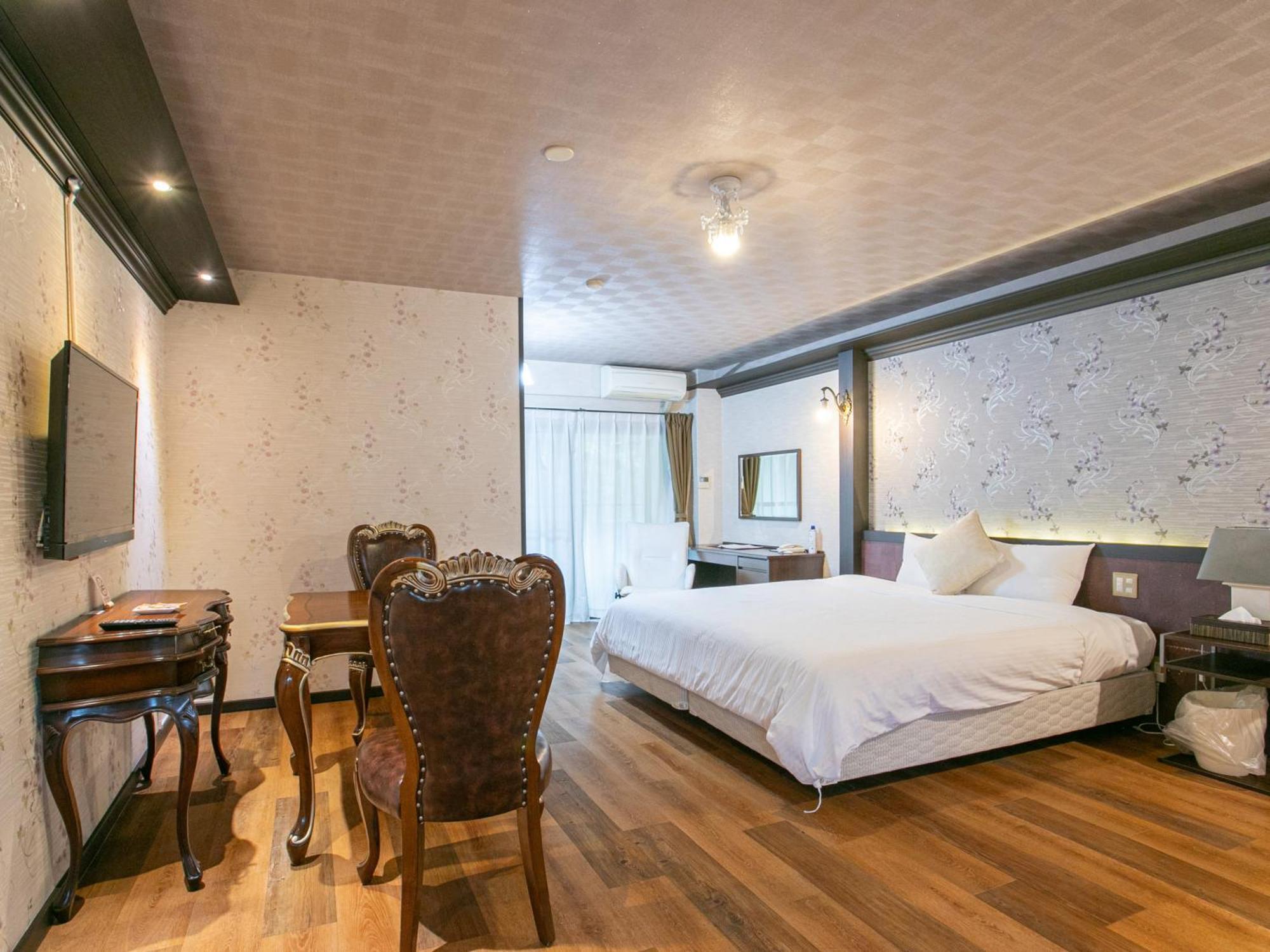 Yufuin Besso Shikisai Hotel Quarto foto