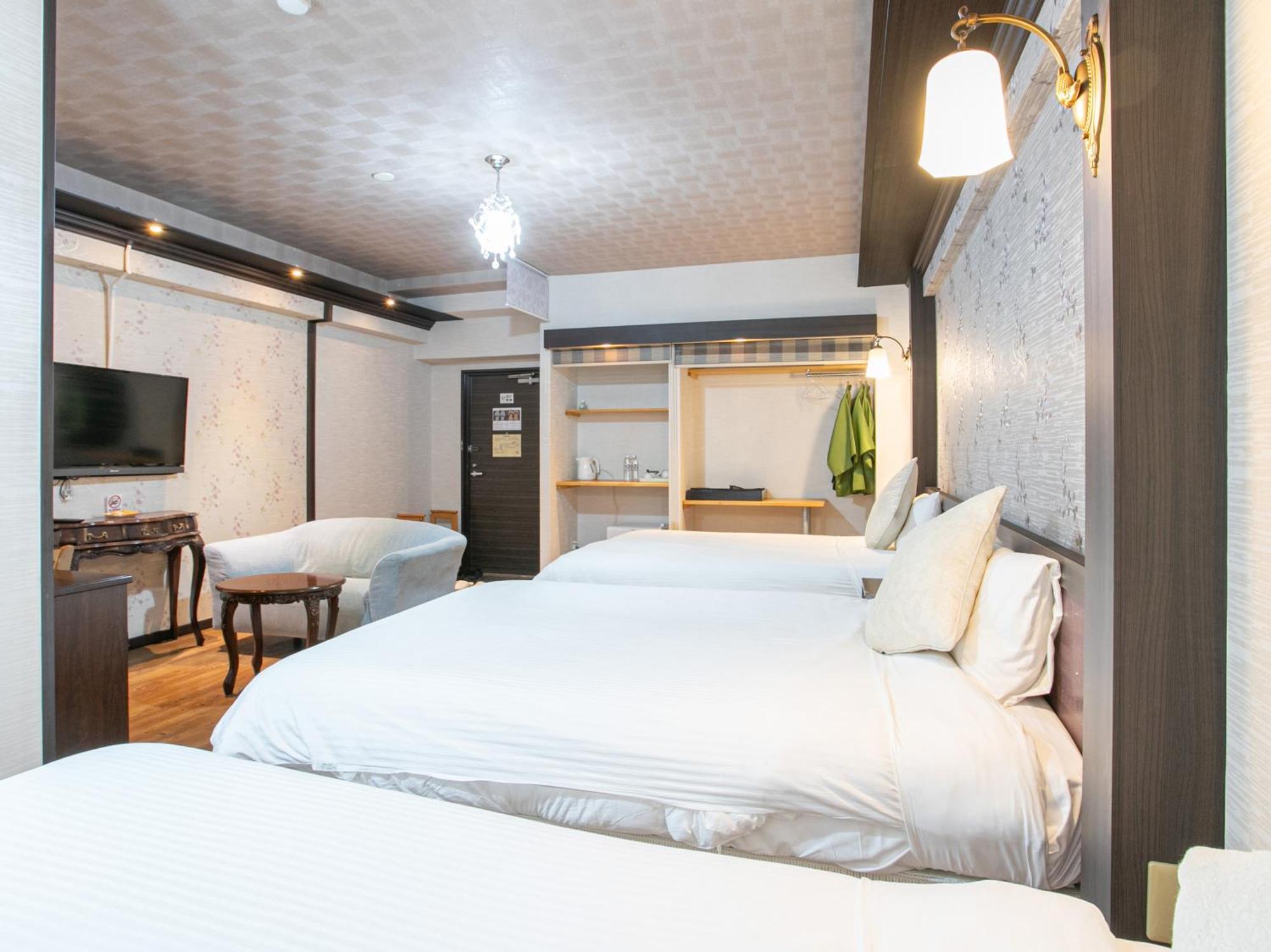 Yufuin Besso Shikisai Hotel Quarto foto