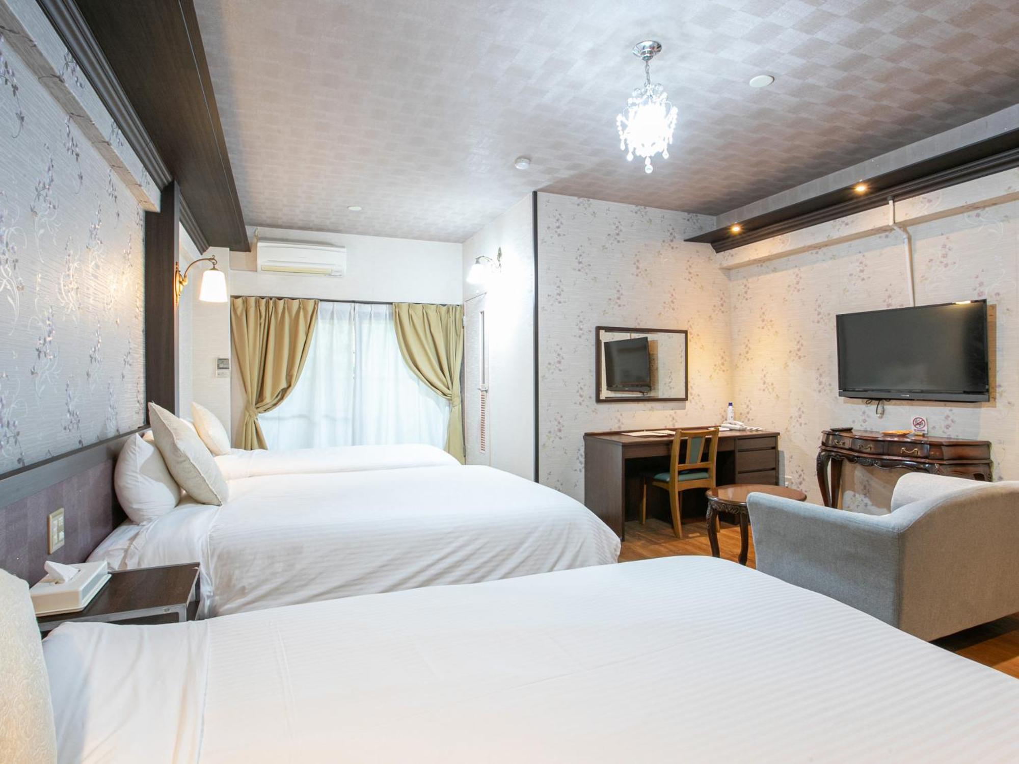 Yufuin Besso Shikisai Hotel Quarto foto